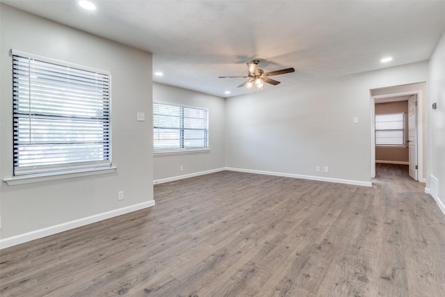 2406 Globe Ave, Dallas, TX 75228 - spare room with a ceiling fan, recessed lighting, and wood finished floors