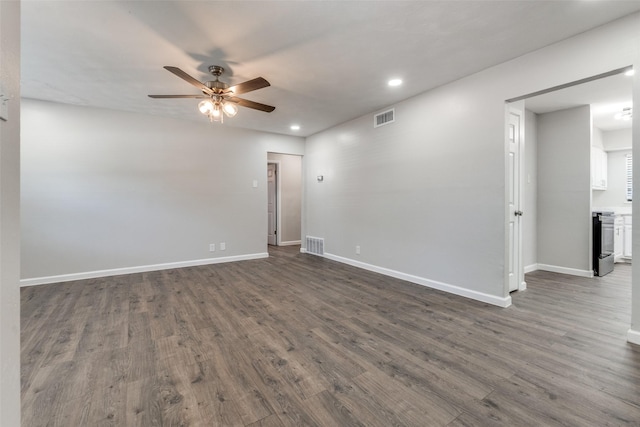 2406 Globe Ave, Dallas, TX 75228 - empty room with a ceiling fan, dark wood-style floors, and recessed lighting