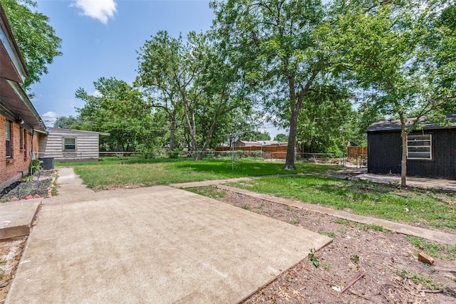 2406 Globe Ave, Dallas, TX 75228 - fenced backyard with a patio
