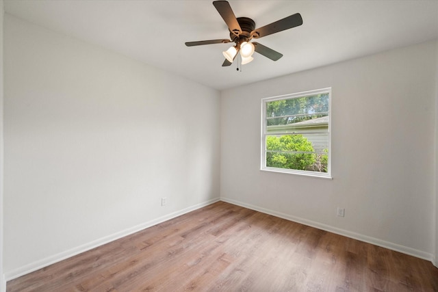 2040 Bowie Dr, Corsicana, TX 75110 - unfurnished room with light wood finished floors and ceiling fan