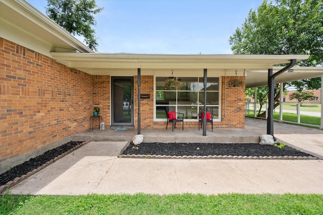 2040 Bowie Dr, Corsicana, TX 75110 - property entrance with a porch and brick siding
