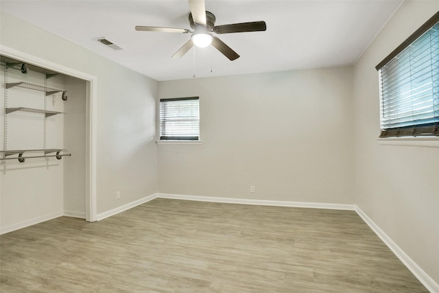 108 Sunnyvale Ter, Hurst, TX 76053 - unfurnished bedroom featuring light wood finished floors, a closet, and ceiling fan