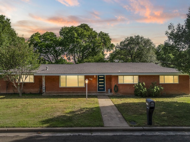 2333 Hermanson Dr, Waco, TX 76710 - ranch-style home featuring a yard and brick siding