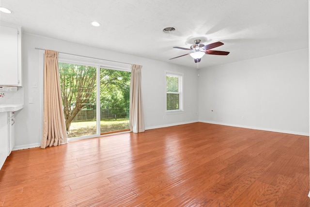 2333 Hermanson Dr, Waco, TX 76710 - empty room with a ceiling fan, light wood-type flooring, and recessed lighting