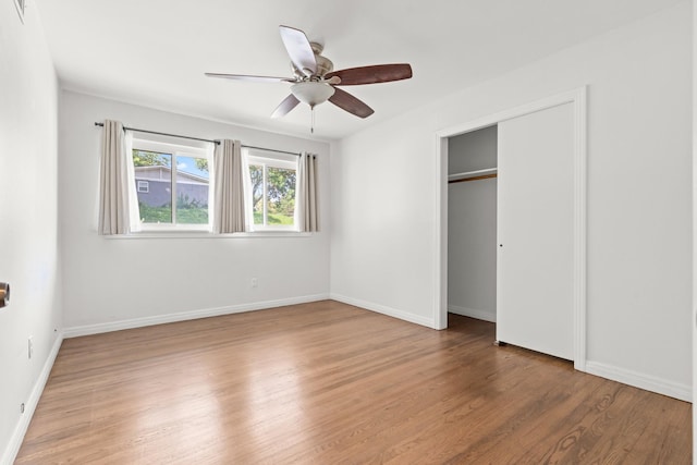 2333 Hermanson Dr, Waco, TX 76710 - unfurnished bedroom with wood finished floors, ceiling fan, and a closet