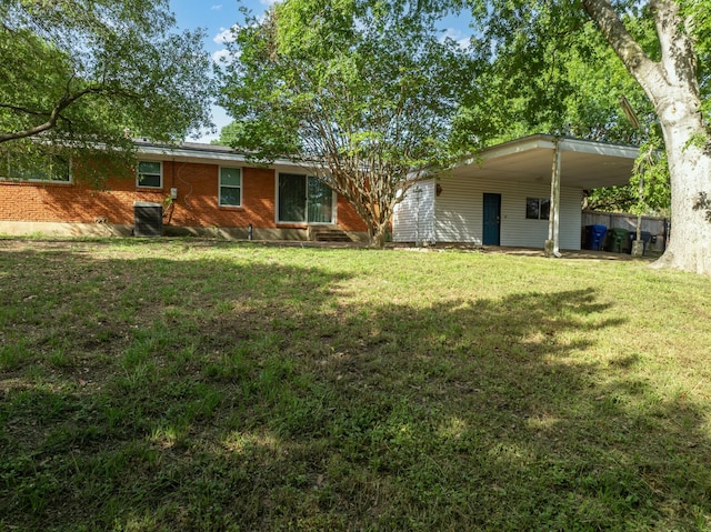 2333 Hermanson Dr, Waco, TX 76710 - view of front of house with a front yard and a carport