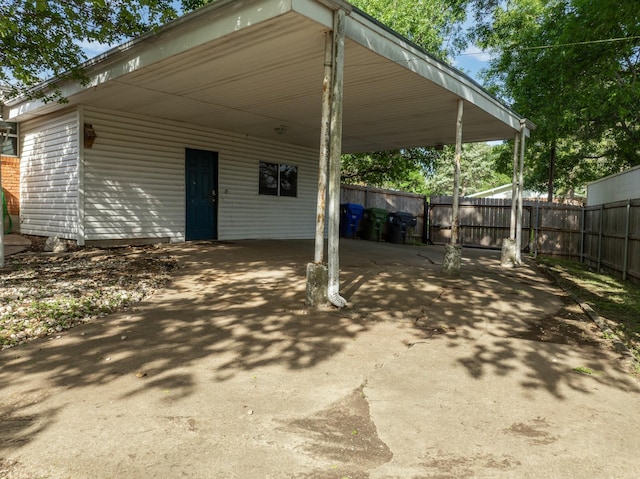2333 Hermanson Dr, Waco, TX 76710 - view of patio / terrace with asphalt driveway and a carport