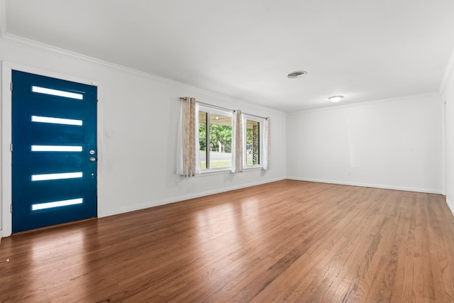 2333 Hermanson Dr, Waco, TX 76710 - entrance foyer featuring wood finished floors and crown molding