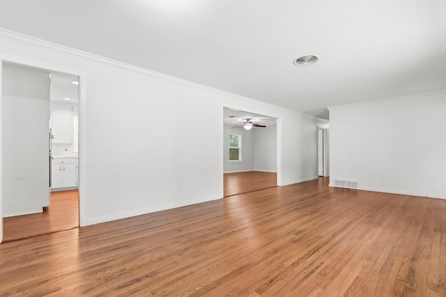 2333 Hermanson Dr, Waco, TX 76710 - unfurnished room featuring light wood-style floors, crown molding, and ceiling fan