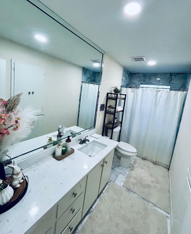 307 E 5th St, Kaufman, TX 75142 - bathroom with vanity, marble look tile flooring, recessed lighting, and a shower with shower curtain