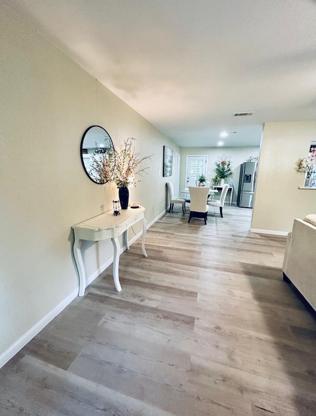 307 E 5th St, Kaufman, TX 75142 - hall with wood finished floors