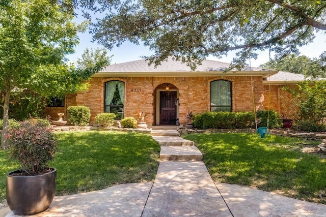6211 White Rose Trl, Dallas, TX 75248 - ranch-style house featuring a front lawn, brick siding, and roof with shingles