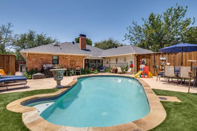 6211 White Rose Trl, Dallas, TX 75248 - view of swimming pool with a patio area