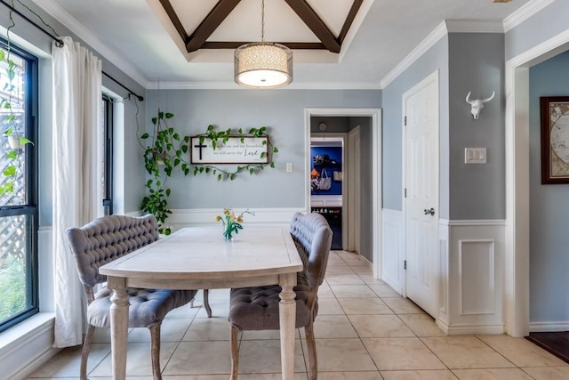 6211 White Rose Trl, Dallas, TX 75248 - dining space featuring plenty of natural light, ornamental molding, wainscoting, and light tile patterned flooring