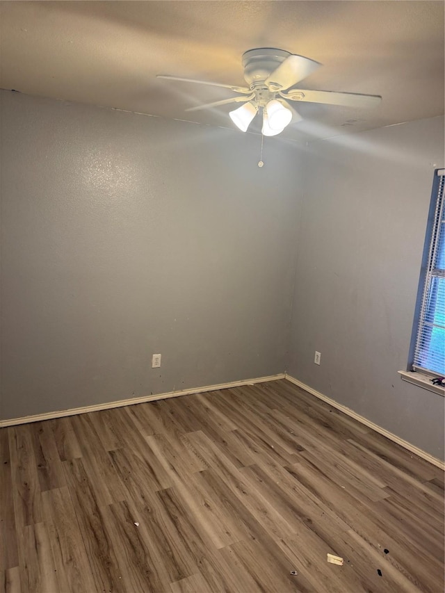 3048 Saint Ursula Dr, Dallas, TX 75233 - spare room with wood finished floors and a ceiling fan