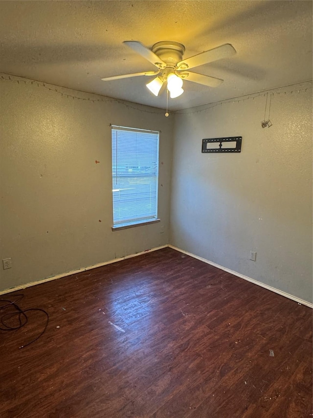 3048 Saint Ursula Dr, Dallas, TX 75233 - spare room featuring wood finished floors, ceiling fan, and a textured ceiling