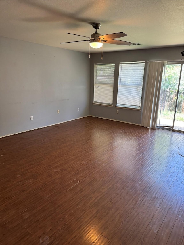 3048 Saint Ursula Dr, Dallas, TX 75233 - unfurnished room featuring dark wood-type flooring and ceiling fan