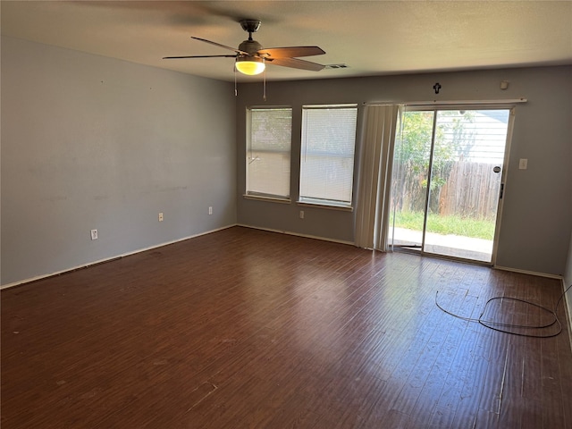3048 Saint Ursula Dr, Dallas, TX 75233 - spare room with dark wood-type flooring and ceiling fan