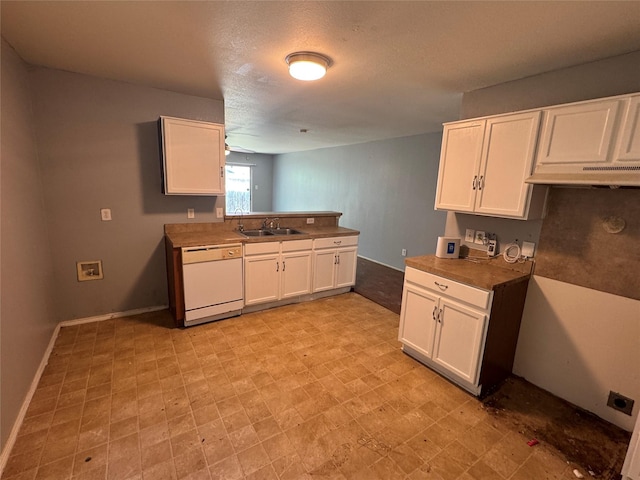 3048 Saint Ursula Dr, Dallas, TX 75233 - kitchen featuring dishwasher, white cabinets, light flooring, under cabinet range hood, and a peninsula