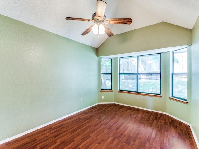 10200 Pack Saddle Ct, Fort Worth, TX 76108 - unfurnished room featuring dark wood finished floors, ceiling fan, and vaulted ceiling