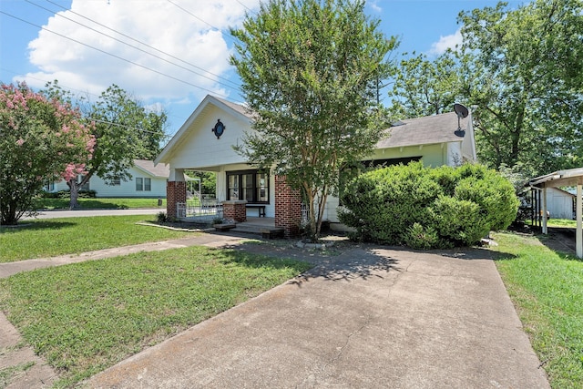 2700 Ethel Ave, Waco, TX 76707 - obstructed view of property featuring covered porch, a front yard, and brick siding