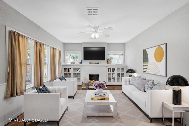 2700 Ethel Ave, Waco, TX 76707 - living room featuring a ceiling fan and a brick fireplace
