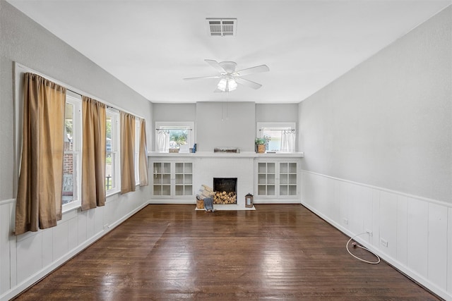 2700 Ethel Ave, Waco, TX 76707 - living area with a brick fireplace, wood finished floors, and a ceiling fan