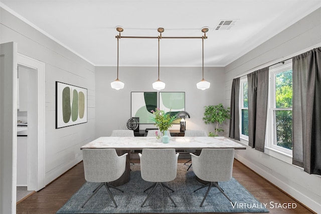 2700 Ethel Ave, Waco, TX 76707 - dining space featuring dark wood-style floors and ornamental molding