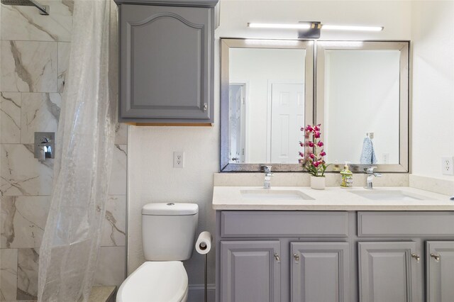 502 Austin Ln, Lavon, TX 75166 - bathroom featuring double vanity and a tile shower
