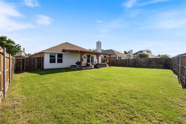 502 Austin Ln, Lavon, TX 75166 - back of house with an outdoor hangout area, a fenced backyard, a patio area, and a chimney
