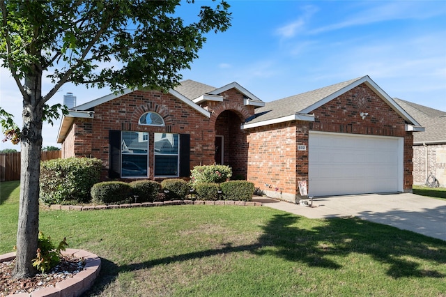 502 Austin Ln, Lavon, TX 75166 - traditional-style house featuring brick siding, an attached garage, driveway, roof with shingles, and a chimney