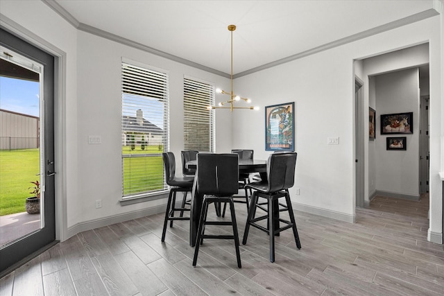 1005 Sinopa St, Caddo Mills, TX 75135 - dining area with light wood-style floors, ornamental molding, a chandelier, and healthy amount of natural light