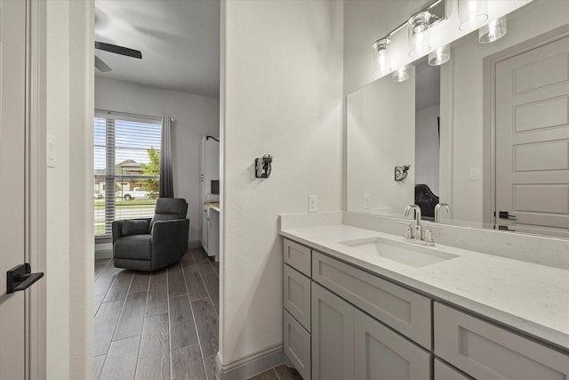 1005 Sinopa St, Caddo Mills, TX 75135 - bathroom featuring vanity, wood finished floors, and ceiling fan