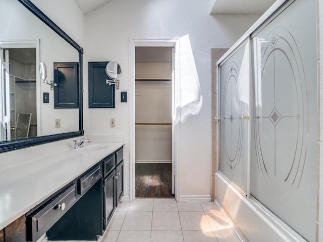 2705 Independence Dr, Mesquite, TX 75150 - full bath featuring vanity, tile patterned flooring, and bathing tub / shower combination