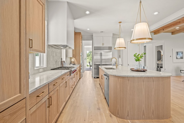 4532 Terroir Dr, Fort Worth, TX 76126 - kitchen with stainless steel appliances, tasteful backsplash, light brown cabinetry, an island with sink, and recessed lighting