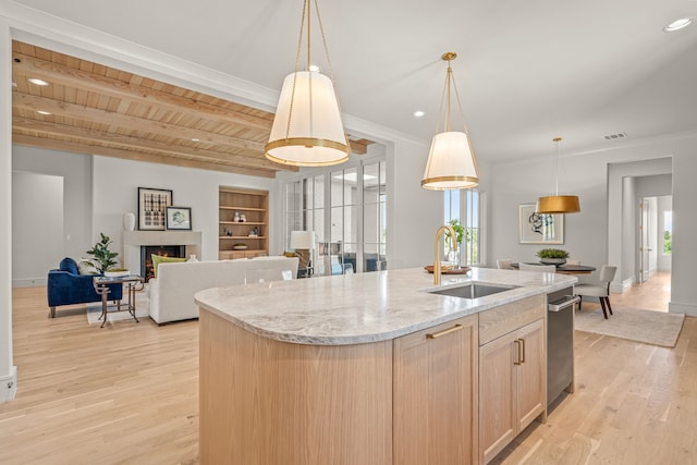 4532 Terroir Dr, Fort Worth, TX 76126 - kitchen with open floor plan, light brown cabinetry, light wood-style flooring, a kitchen island with sink, and recessed lighting