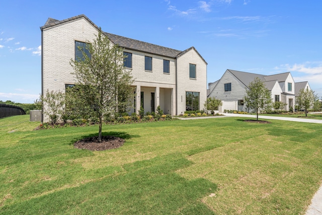 4532 Terroir Dr, Fort Worth, TX 76126 - view of front of home with a front yard and brick siding