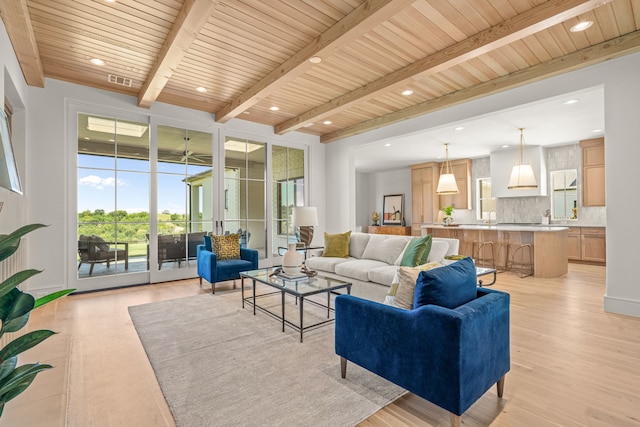 4532 Terroir Dr, Fort Worth, TX 76126 - living room featuring light wood finished floors, recessed lighting, and a wooden ceiling with exposed beams