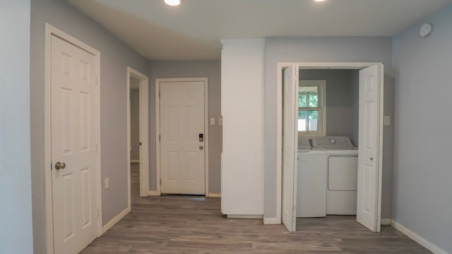 1619 Baylor Ave, Waco, TX 76706 - laundry room with wood finished floors, separate washer and dryer, and recessed lighting