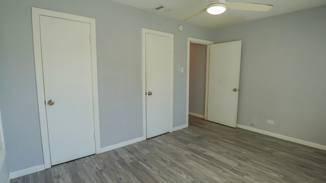 1619 Baylor Ave, Waco, TX 76706 - unfurnished bedroom with wood finished floors and ceiling fan
