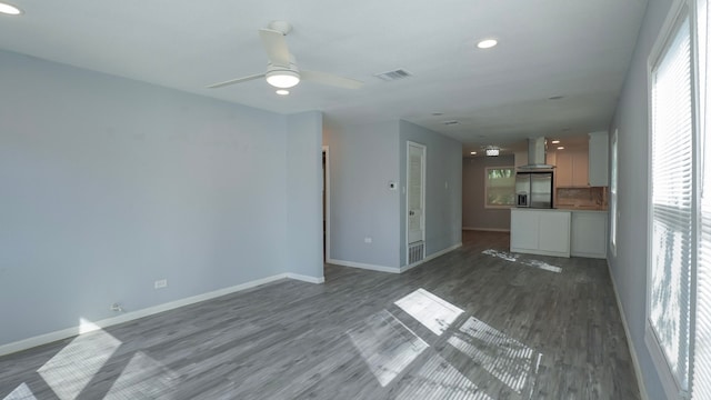 1619 Baylor Ave, Waco, TX 76706 - unfurnished living room featuring dark wood finished floors, recessed lighting, and ceiling fan