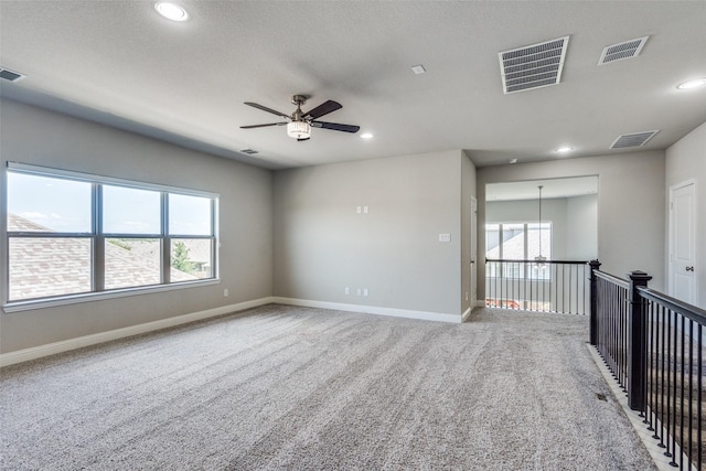 6105 Horsetail Dr, Mckinney, TX 75071 - unfurnished room with a ceiling fan, carpet floors, and recessed lighting