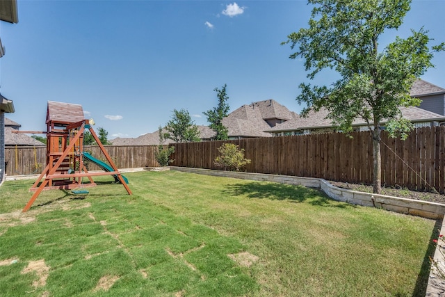 6105 Horsetail Dr, Mckinney, TX 75071 - fenced backyard with a playground