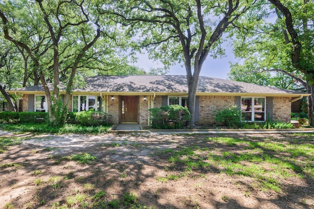 1203 Woodridge Cir, Euless, TX 76040 - ranch-style home featuring brick siding