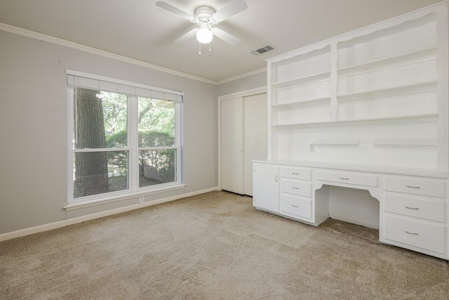 1203 Woodridge Cir, Euless, TX 76040 - unfurnished office featuring light colored carpet, crown molding, ceiling fan, and built in desk