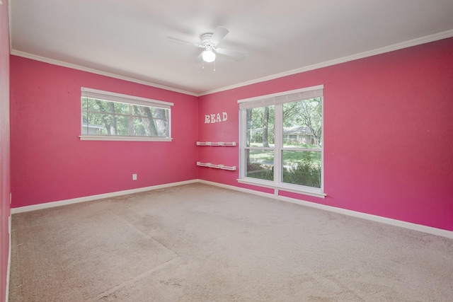 1203 Woodridge Cir, Euless, TX 76040 - spare room with healthy amount of natural light, a ceiling fan, carpet floors, and ornamental molding
