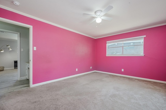 1203 Woodridge Cir, Euless, TX 76040 - carpeted empty room featuring a smoke detector, a ceiling fan, and crown molding