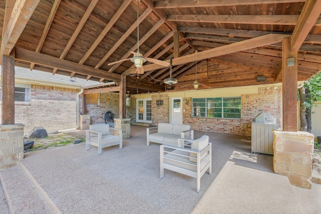 1203 Woodridge Cir, Euless, TX 76040 - view of patio with a ceiling fan, grilling area, an outdoor living space, and french doors