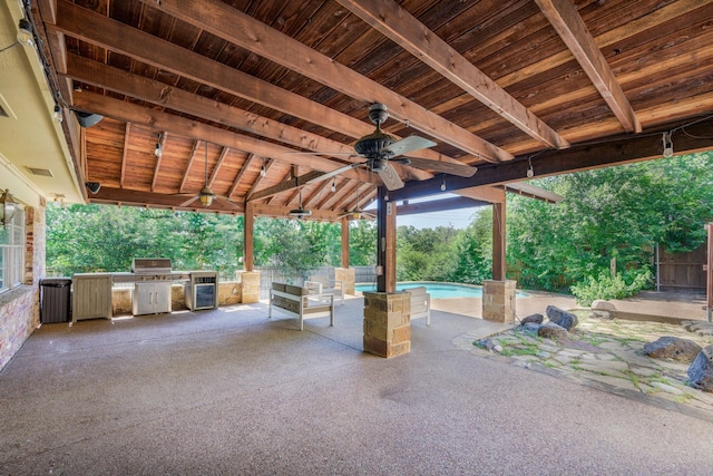 1203 Woodridge Cir, Euless, TX 76040 - view of patio featuring exterior kitchen, ceiling fan, an outdoor pool, and wine cooler
