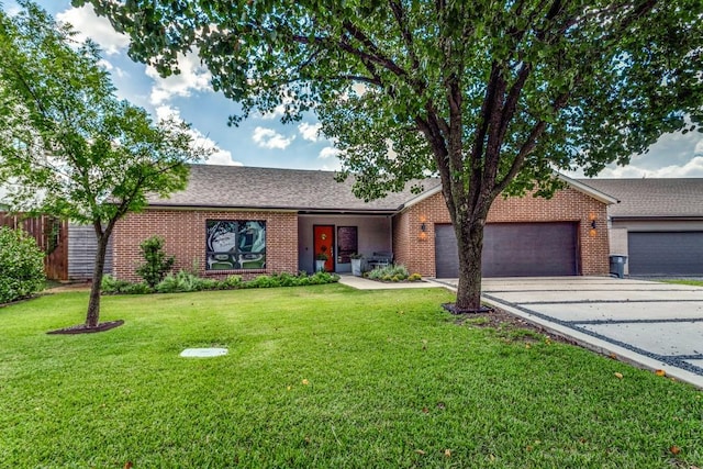 3866 Lively Ln, Dallas, TX 75220 - view of front facade with concrete driveway, a garage, brick siding, and a shingled roof
